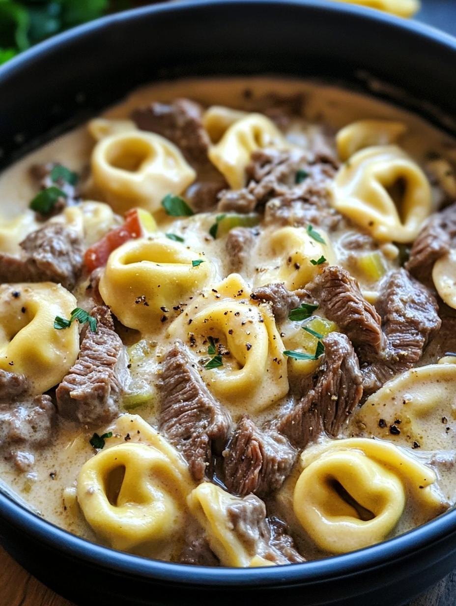 Slow Cooker Cheesesteak Tortellini in Creamy Provolone Sauce